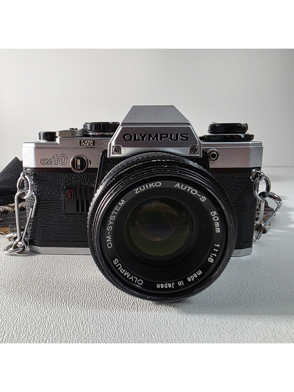 Olympus OM10 With Zuiko 50mm F1.8 Lens W/Neck Strap & Manual